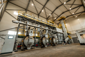 industrial machinery and equipment for the production of eco-friendly wood pellets in a sustainable...