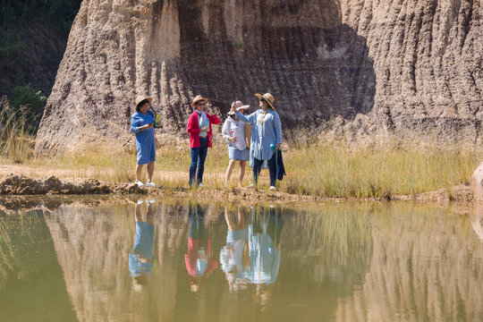 Asian senior elderly healthy group of females selfie taking picure together at natural park, pensioner friends recreation traveling freedom holiday vacation after retirement, aging society lifestyle