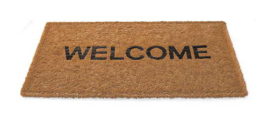 Welcoming front door mat displaying the text word WELCOME, setting a hospitable tone for guests approaching the entrance of the home