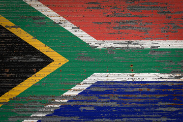 Close-up of old metal wall with national flag of South Africa. Concept of South Africa...