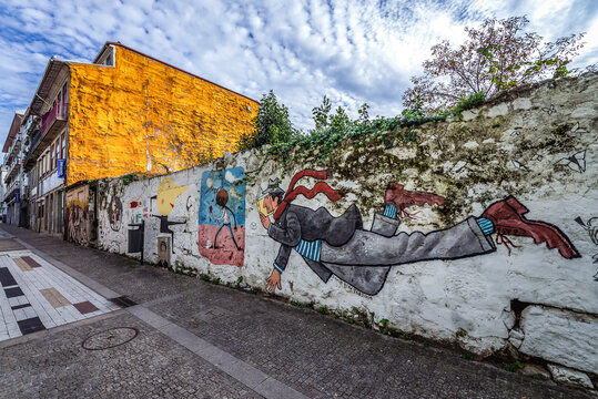 Porto, Portugal - December 8, 2016: Wall painting by David Pintor on Miguel Bombarda street in Massarelos area of Porto