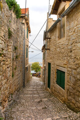 A residential street in the historic coastal village of Sutivan, Brac Island, Croatia