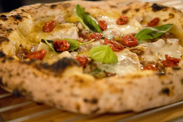 Experience street food by tasting freshly baked pizza made in Naples in multiple flavors and various types