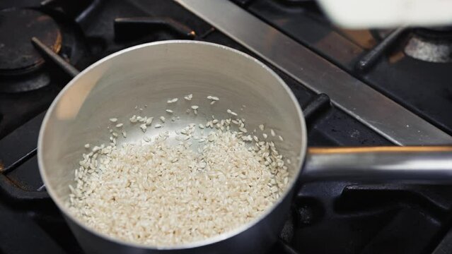 Mixing rice for a risotto meal 