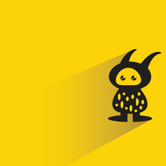 monster character with shadow on yellow background
