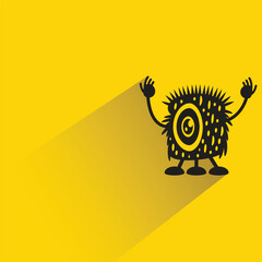 monster character with shadow on yellow background