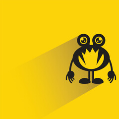 monster character with shadow on yellow background