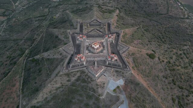 Drone footage over the Fortress of Nossa Senhora da Graca at sunrise in Elvas, Portugal