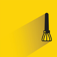 paint brush icon with shadow on yellow background