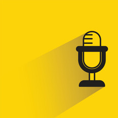 microphone icon with shadow on yellow background