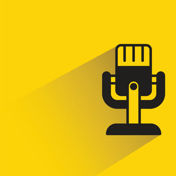 microphone icon with shadow on yellow background