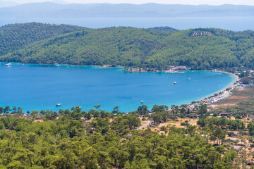 Fototapeta na wymiar amazing view of Datca, Mugla. Paradise bay; blue sea and green tree forest