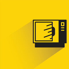 microwave icon with shadow on yellow background