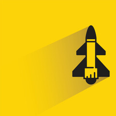 missile and rocket icon with shadow on yellow background