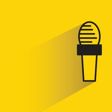 microphone icon with shadow on yellow background