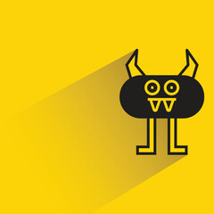 funny monster character with shadow on yellow background