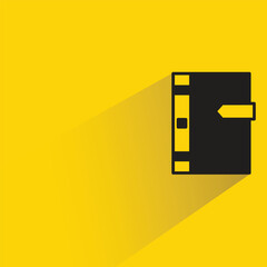 book icon with shadow on yellow background