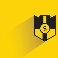 dollar shield icon with shadow on yellow background