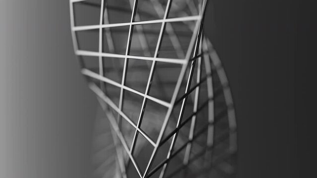 Looped 3D animation of the rotation of a geometric Mobius figure. The geometry is built from chrome plated metal cylinders. Close-up. Defocus.