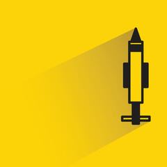 missile icon with shadow on yellow background