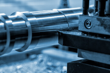 Mesmerizing close-up of a cutting machine skillfully shaping metal with precision and grace.