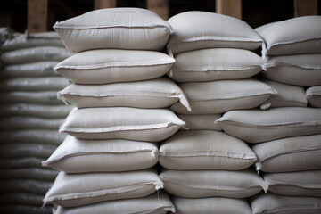 White cement bags stored in warehouse