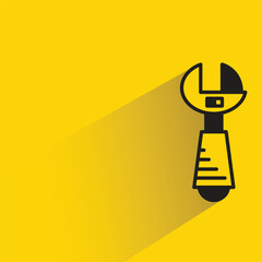 wrench icon with shadow on yellow background