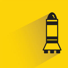 missile and rocket icon with shadow on yellow background