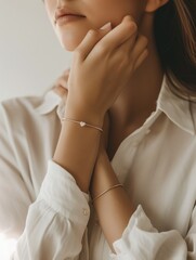 Close-up of a woman adorned with delicate jewelry, evoking subtle elegance