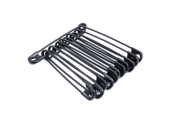 Safety pin isolated on white. Black color sewing purpose eye. Set of metal tools. Group of safety pins. Sewing tool object background.