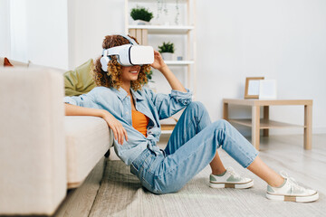 Virtual Reality Enjoyment: A Young Woman Smiling and Laughing, Using VR Goggles at Home, Surrounded...