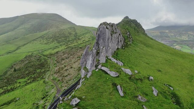 Drone flyover Rocha dos Frados on cloudy day in Flores Island, azores archipelago