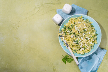 Tagliatelle pasta with spinach and cottage cheese