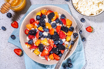 Summer fruit and berry salad with cottage cheese
