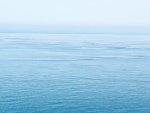 Calm blue sea water surface at morning. 