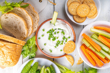 Cottage cheese dip with vegetables and crackers