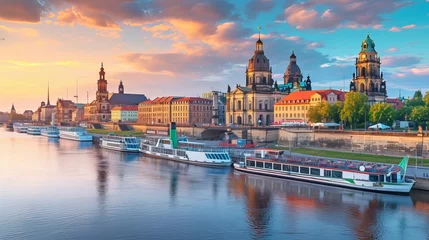 Foto op Plexiglas Dresden, Germany. Panoramic over old city historical downtown, Elbe river and party boats with young people celebrating hot summer day at sunset © Azad