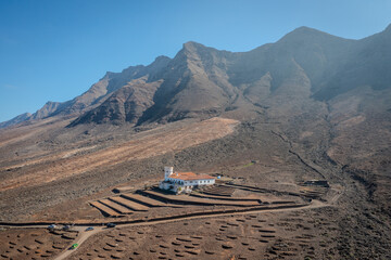 aerial view on a mansion at the coast of Fuerteventura - obrazy, fototapety, plakaty