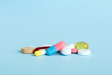 Many different colorful medication and pills perspective view. Set of many pills on colored background