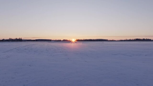 Foggy sunset in the field from the sky 