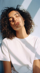 Young cool calm woman hipster gen z beauty model wearing white t-shirt posing with eyes closed on color background. Face flawless fresh skin hair care cosmetic treatment makeup products skincare ads .
