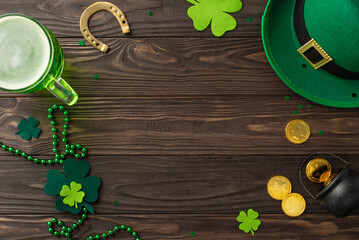 Toast to St. Patrick's Day at the bar! Top view of ale glass, leprechaun's hat, lucky horseshoe,...