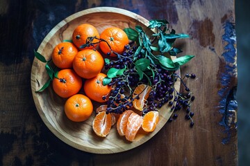 a plate of oranges and fruit