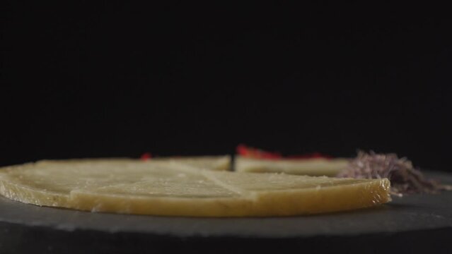 Cured cheese dish made with natural rennet