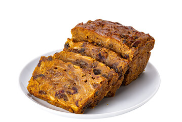 Slice of delicious homemade fruitcake in white ceramic plate isolated on white background with clipping path..