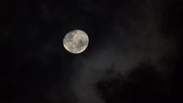 Gray Clouds In Front Of White moon , night move scene