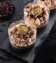 Classic tiramisu dessert in a glass top view