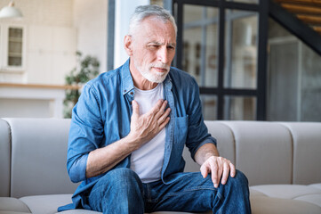 Mature man have asthma disease, respiratory, breathing problem