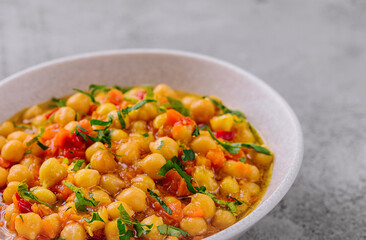 Cooked chickpeas in a white bowl