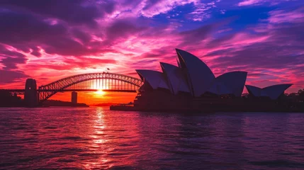 Papier Peint photo Sydney Harbour Bridge Sydney Opera House and Sydney Harbour Bridge at sunset, Australia. A breathtaking photograph capturing the iconic Sydney Opera House and Harbor Bridge silhouetted against a vibrant sunset sky. 